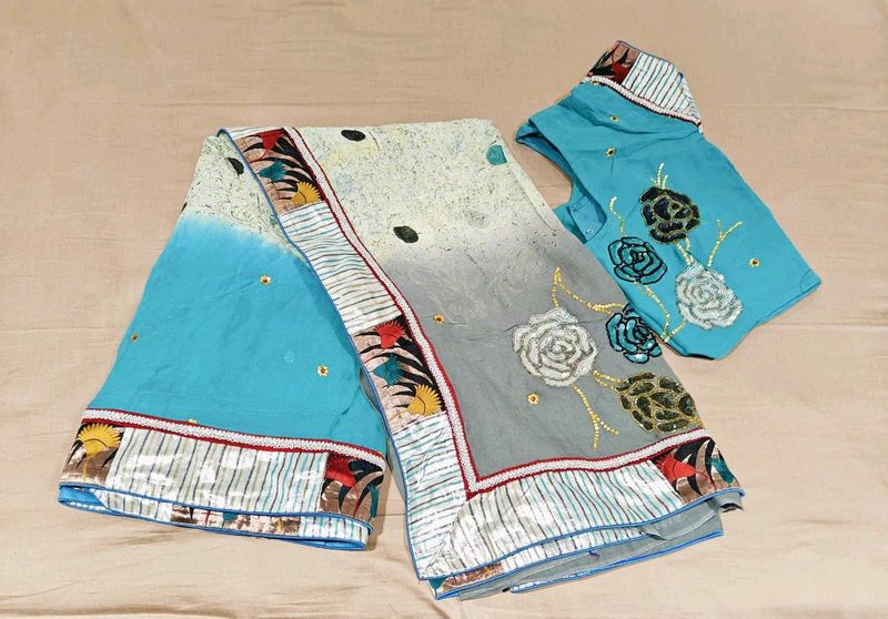Chiffon saree with a print blouse