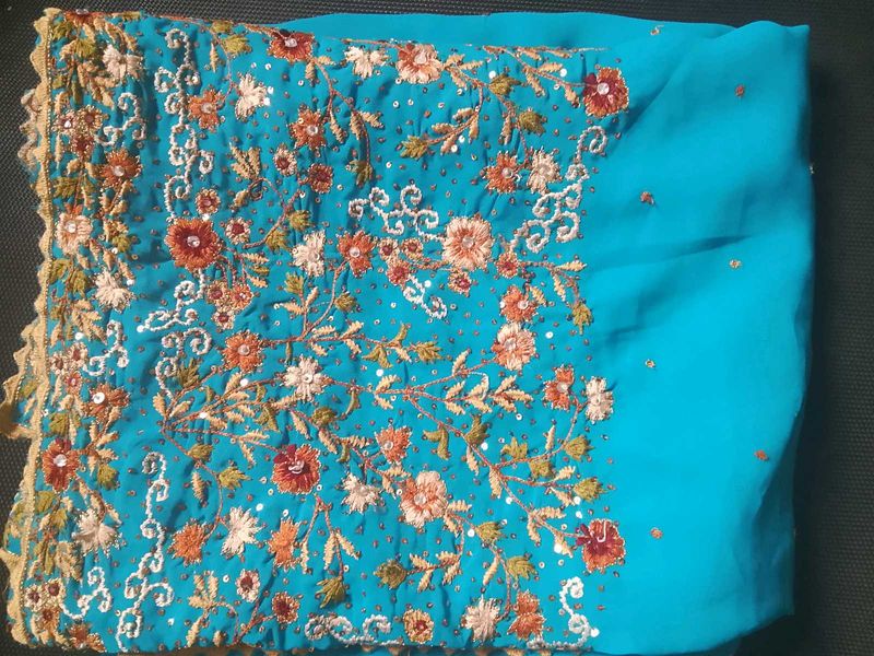 Stunning Embroidered Teal Saree