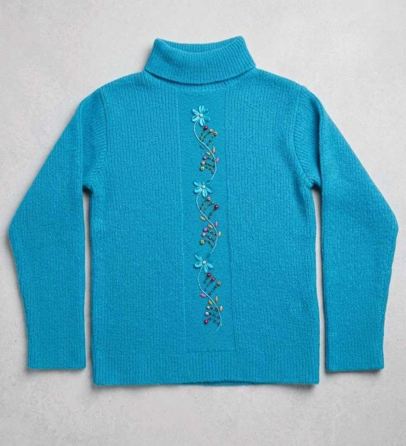 Turquoise Turtleneck Sweater with Floral Embellish