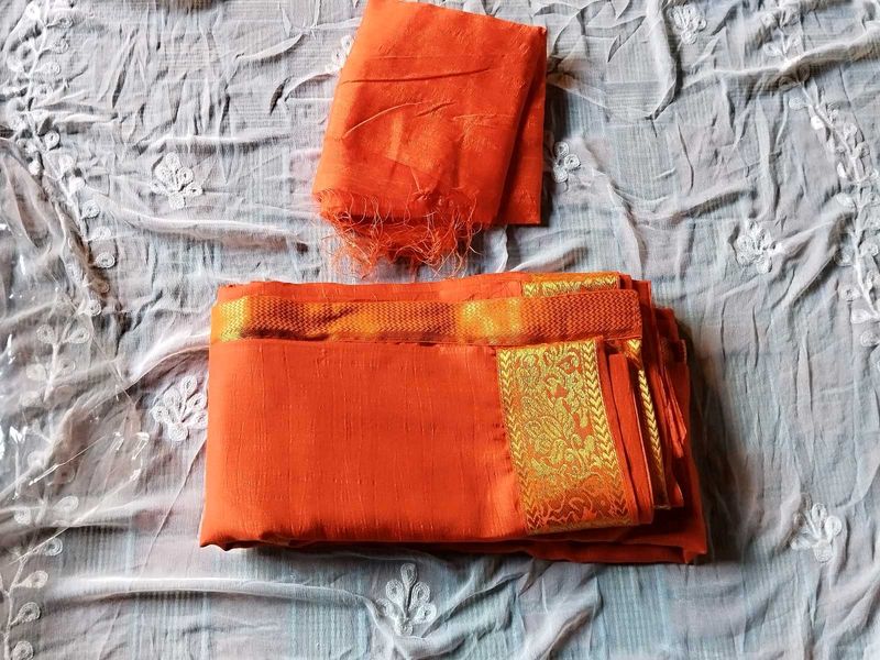 Vibrant Orange Saree with Golden Border