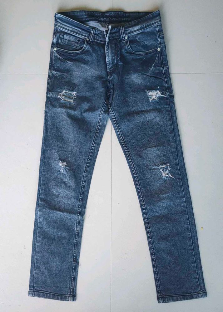 Distressed Denim Jeans