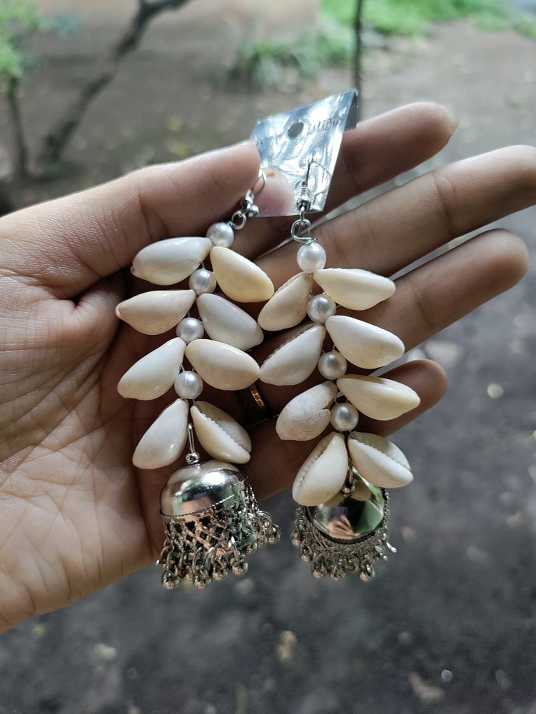 cowrie shells earrings (brings positive vibes and good luck, known as "gift from ocean"