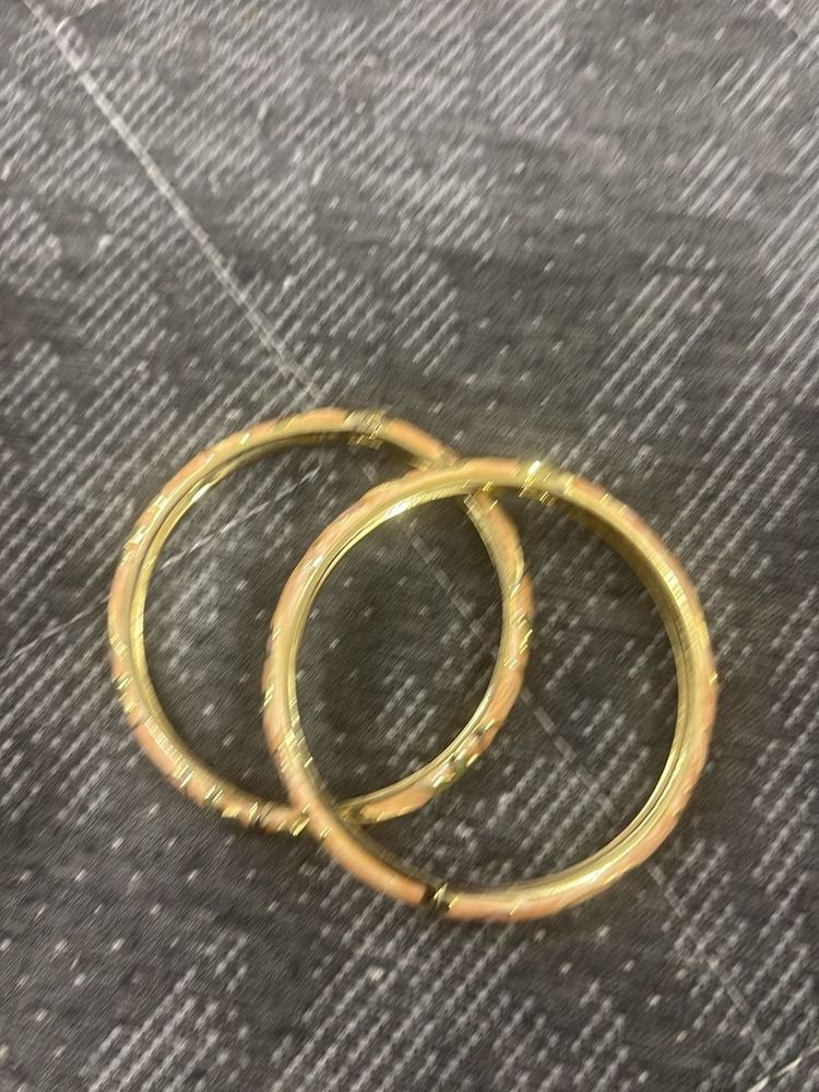 Elegant Gold and Peach Bangles