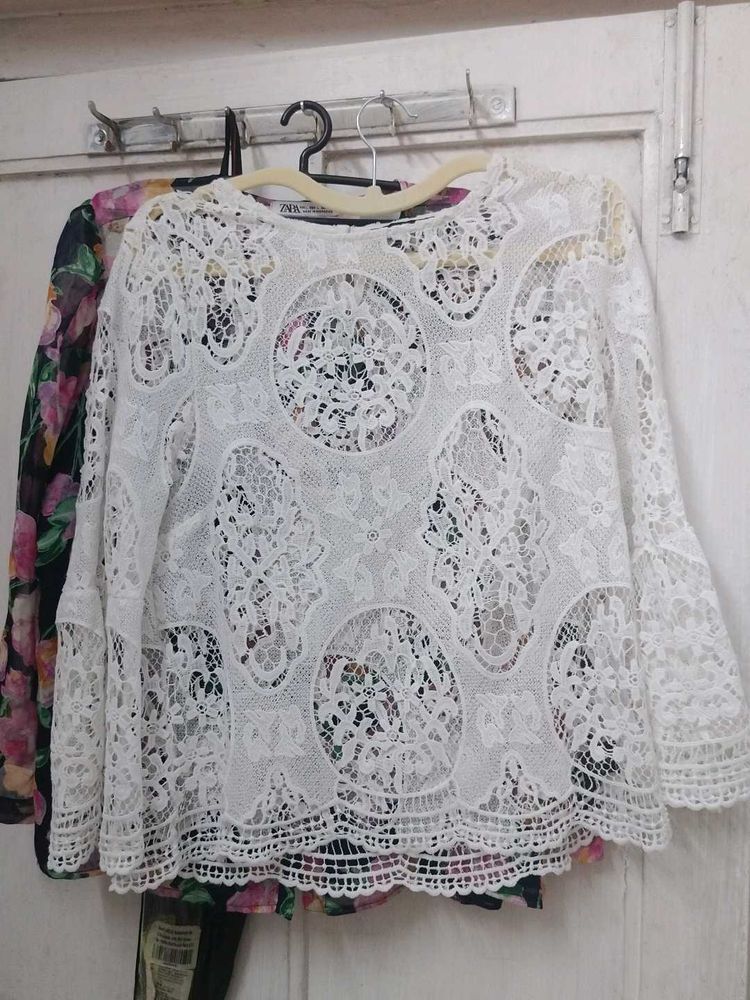 white lace top. bell sleeves