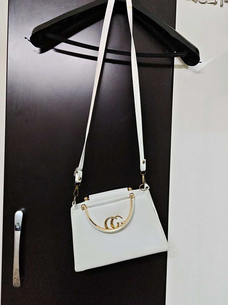 Chic White Handbag with Gold Accent