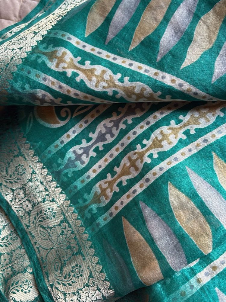 Elegant Teal Saree with Intricate Border