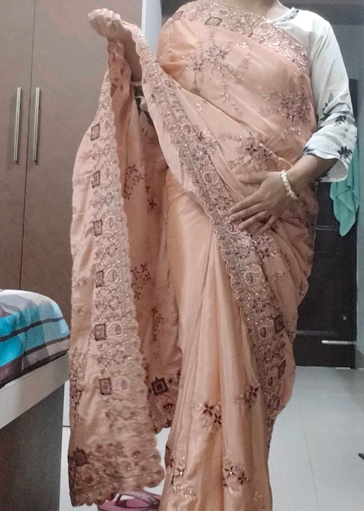 Elegant Peach Embroidered Saree