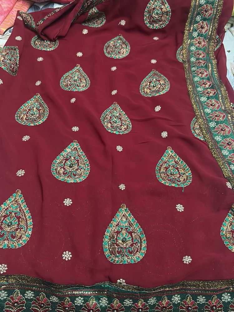 Embroidered Maroon Silk Saree