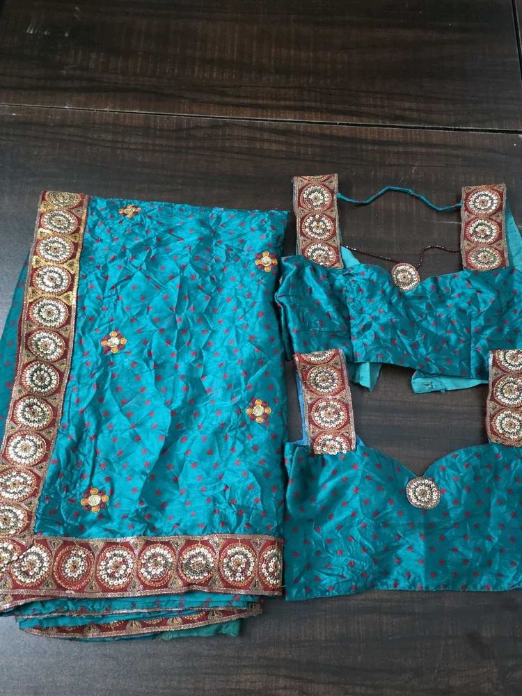 Teal Saree with 2 sleevless Blouse