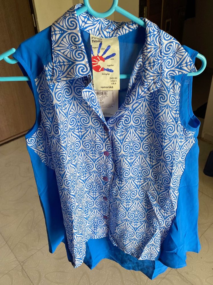Brand New Remanika Sleeveless Shirt – Size XS