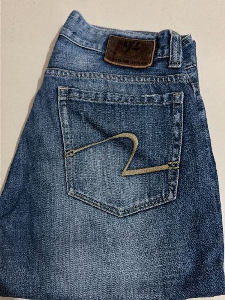 Distressed Blue Denim Jeans