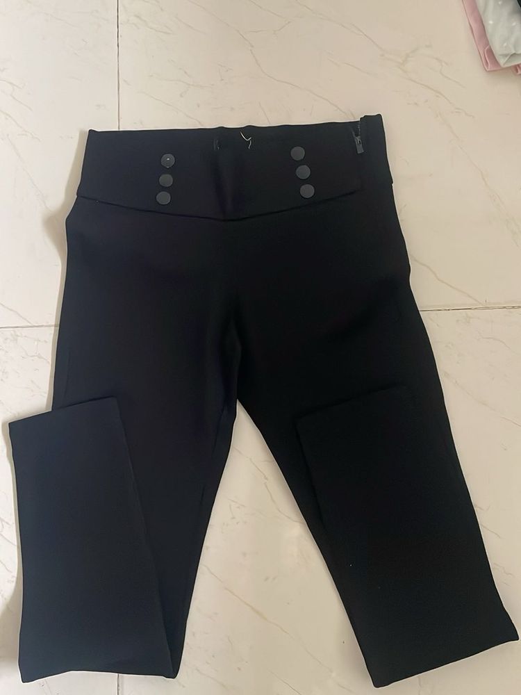 High-Waisted Black Pants with Button Detail