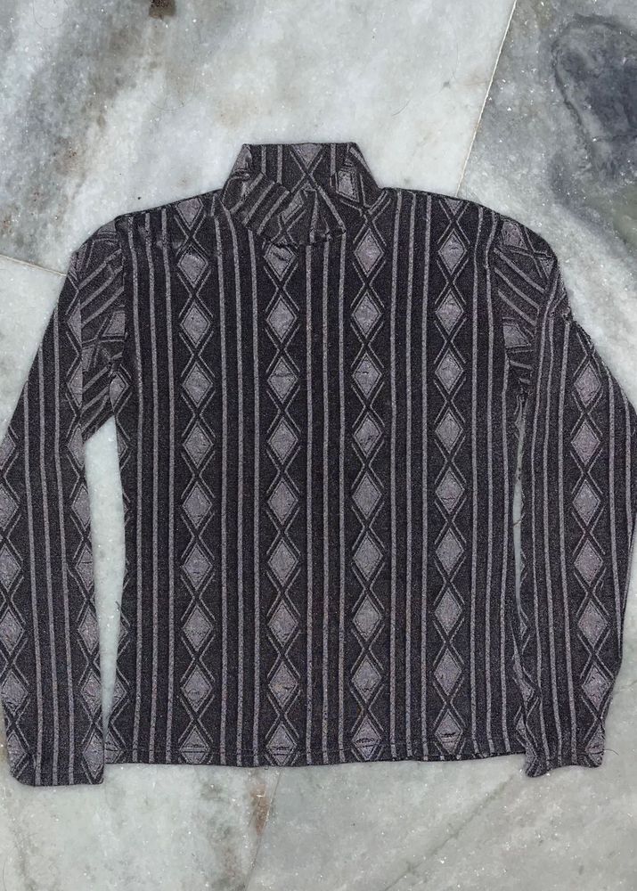 See through Patterned Turtleneck Top