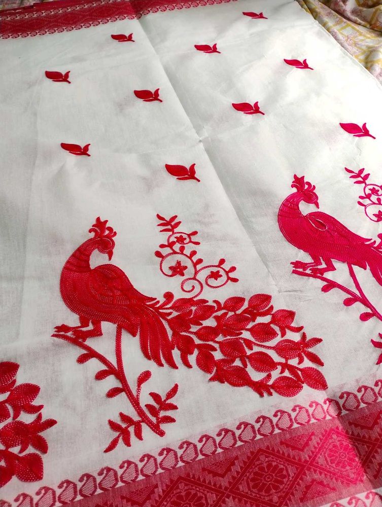 Elegant White Saree with Red Peacock