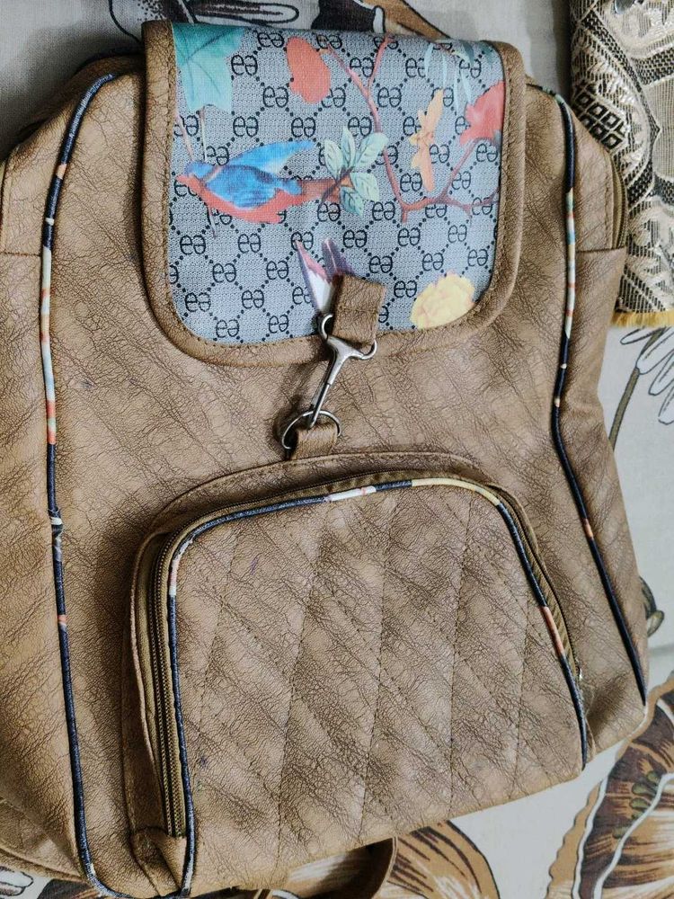 Brown Backpack with 3 chains ⛓️ space