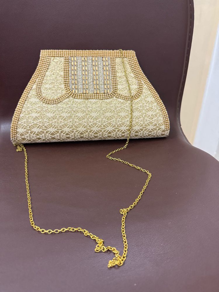Elegant Clutch with Chain Strap