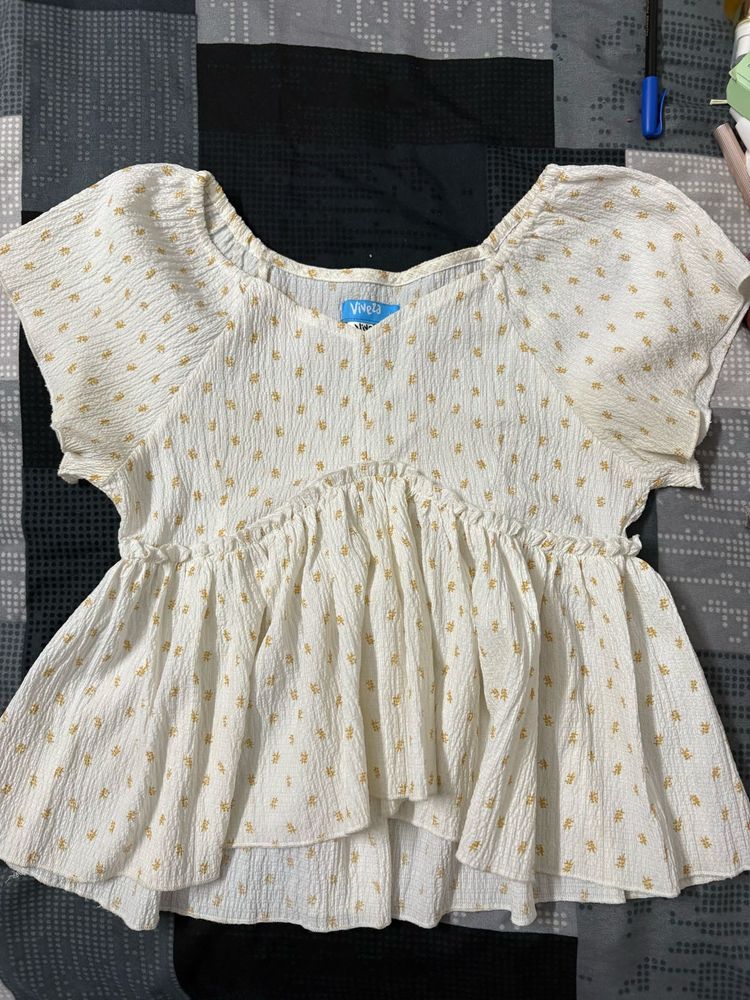 Chic White Floral Peplum Top