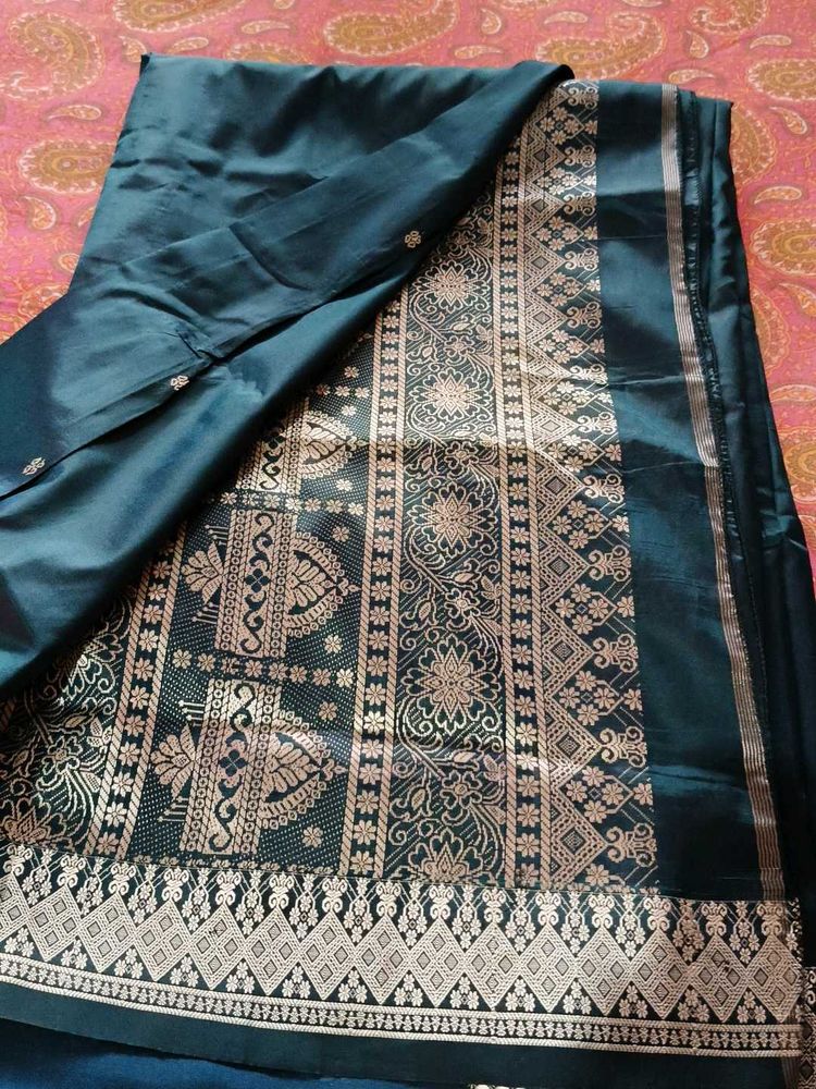 Elegant Teal Saree with Intricate silver Weave