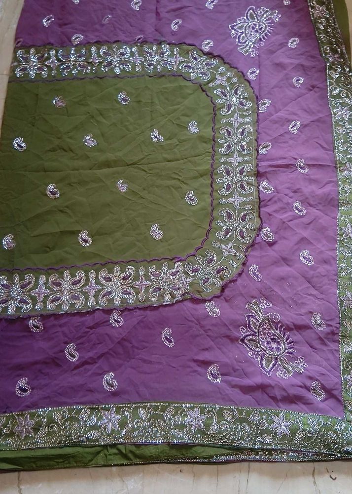 Embroidered green and purple Saree