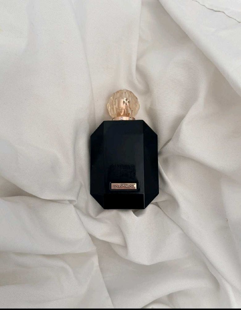 Revolution  Perfume Bottle,HALF USED,FIXED PRICE