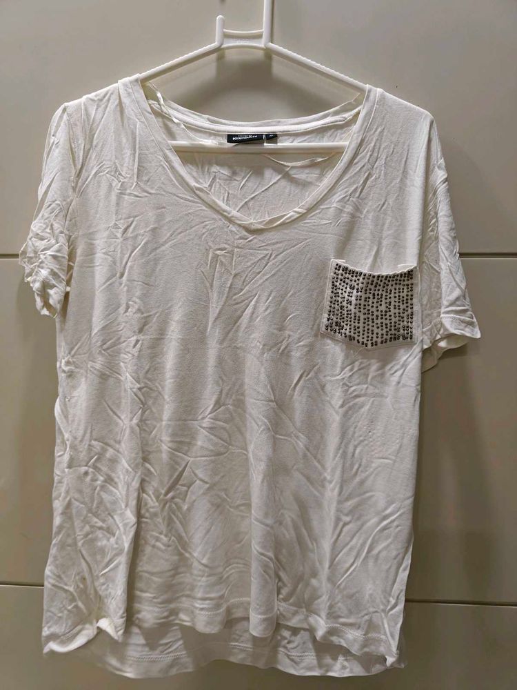 white tee with beeded pocket style