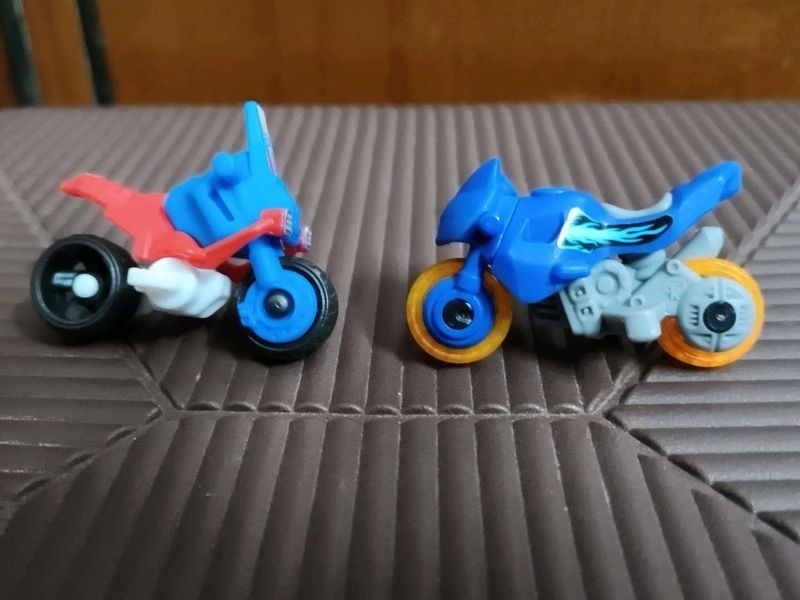 set of 2 kinder Joy bike toys