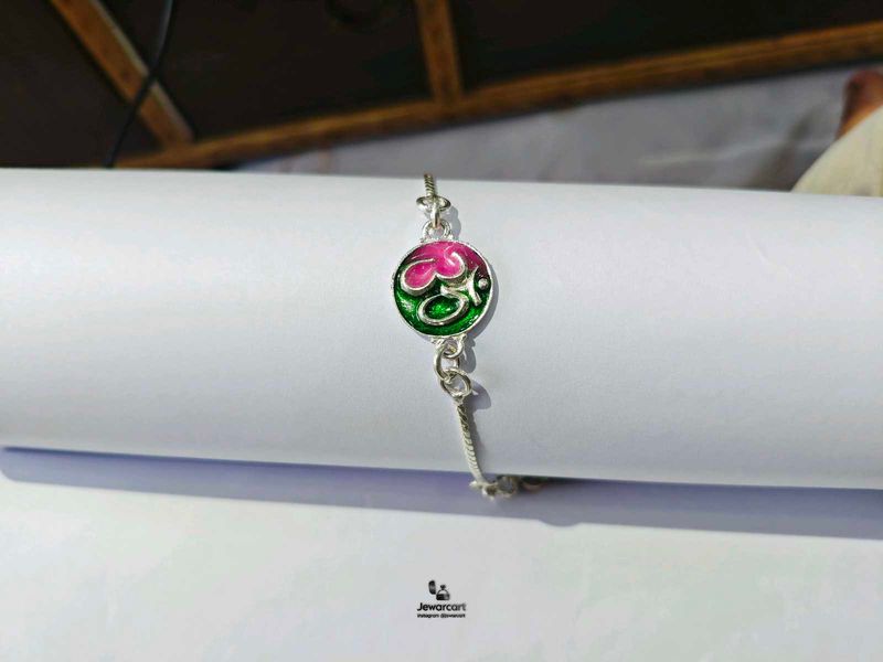 Elegant Enamel Pure Silver Rakhi