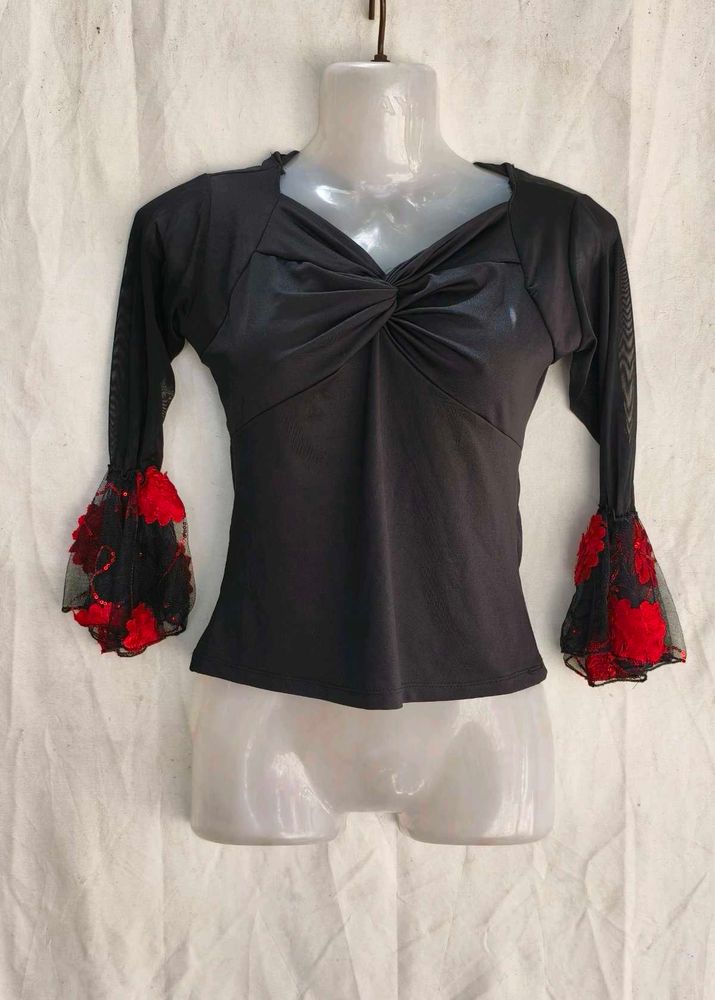 I. Stylish Black Top with Bell Sleeves
