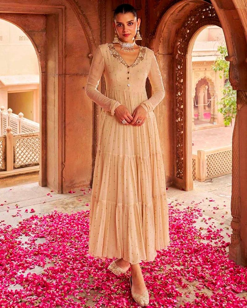 Elegant Tiered Gown with Embellishments