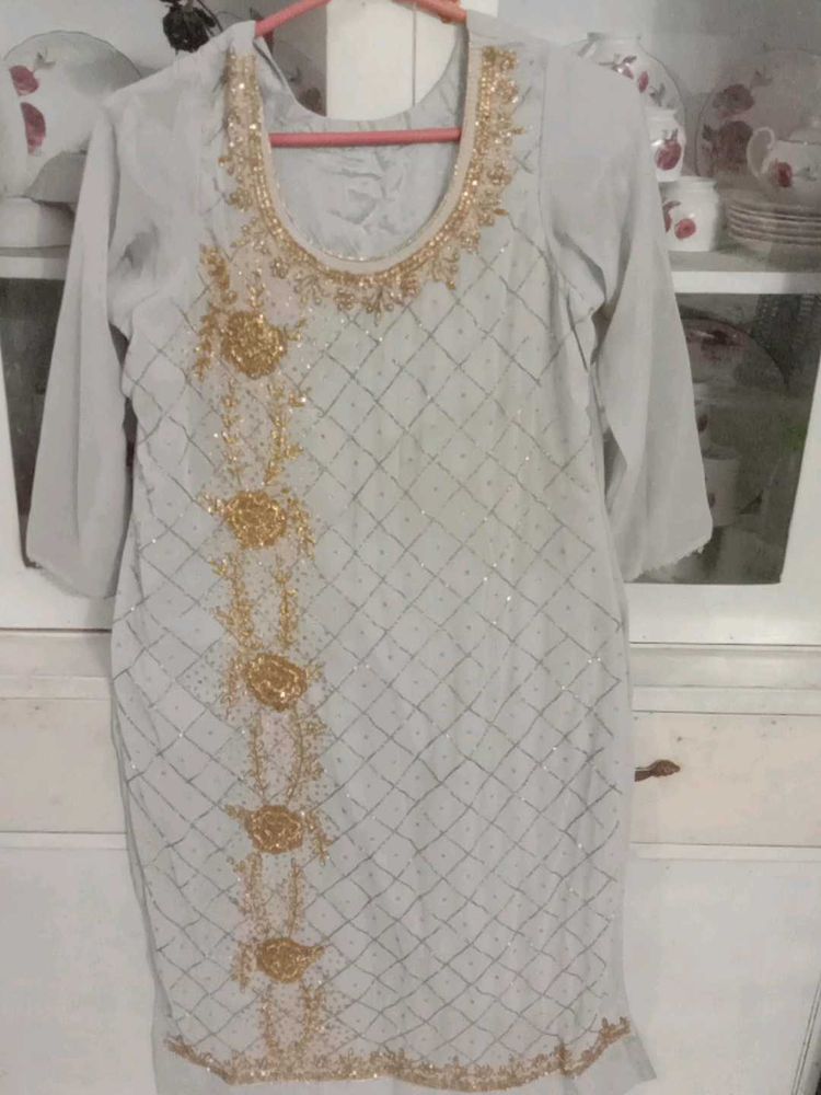 beautiful handwork kurta trouser set with heavy du