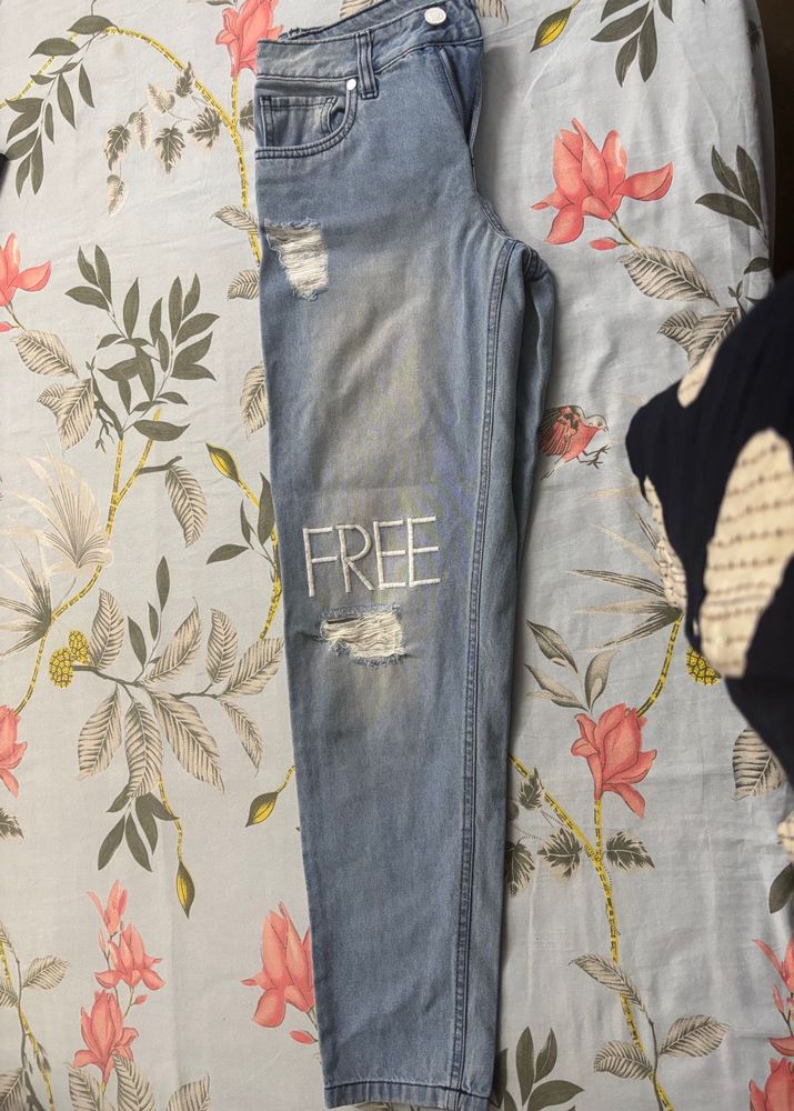Distressed Light Wash "FREE" Jeans