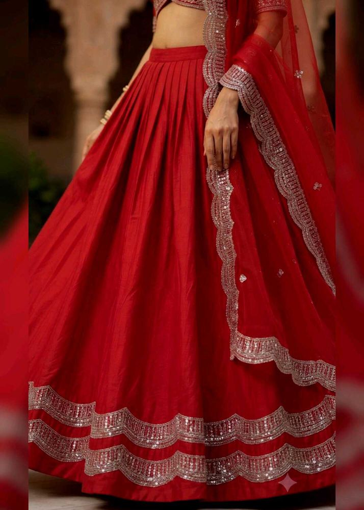 Stunning Red Lehenga Choli with Silver Embellishme