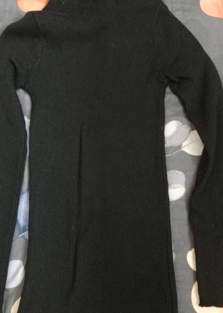 Black Ribbed Turtleneck Sweater