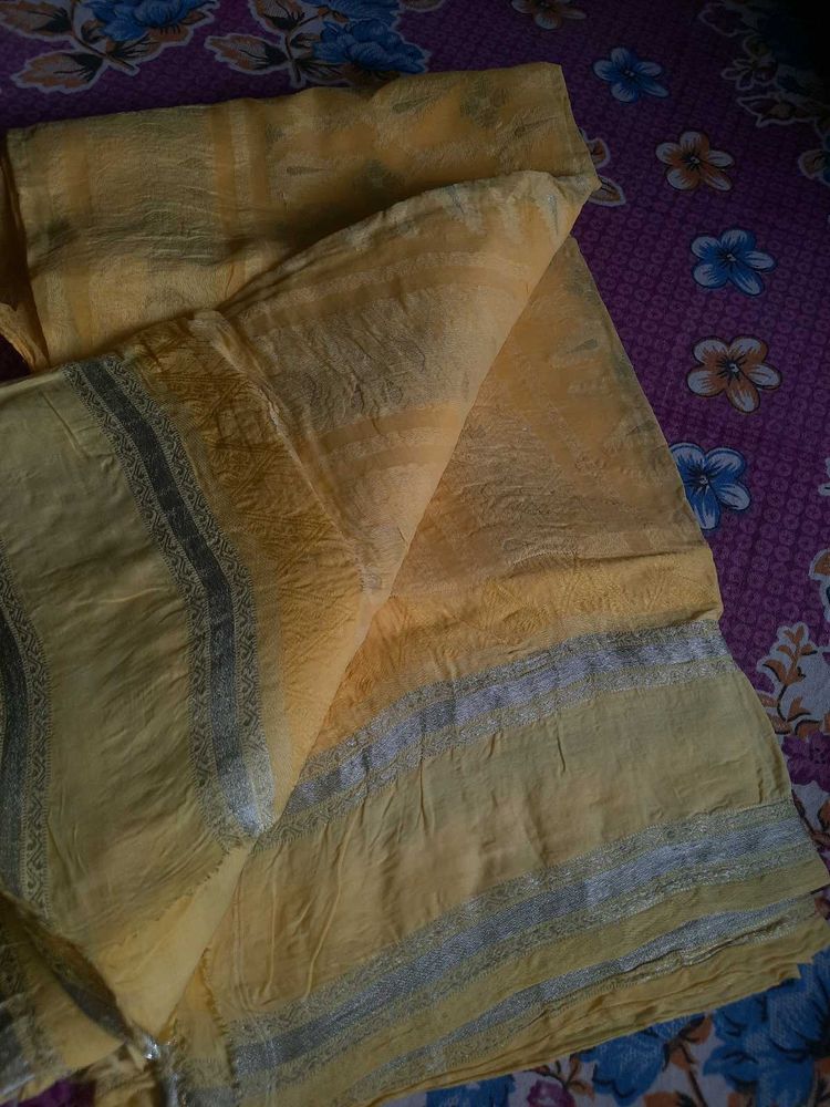 Elegant Yellow Saree with Silver Border