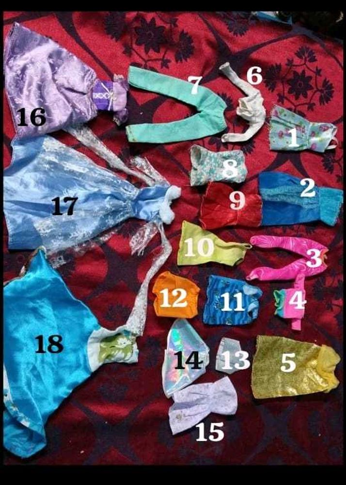 new and old Barbie dolls cloth lot