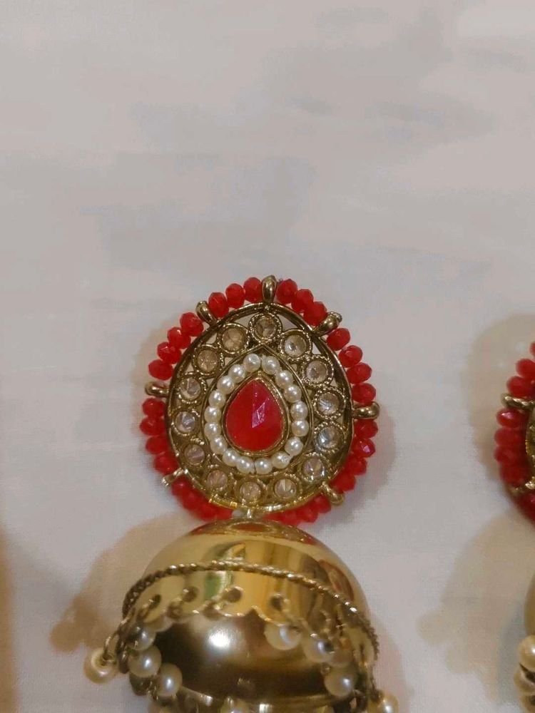 Elegant Jhumka Earrings with Red Stones