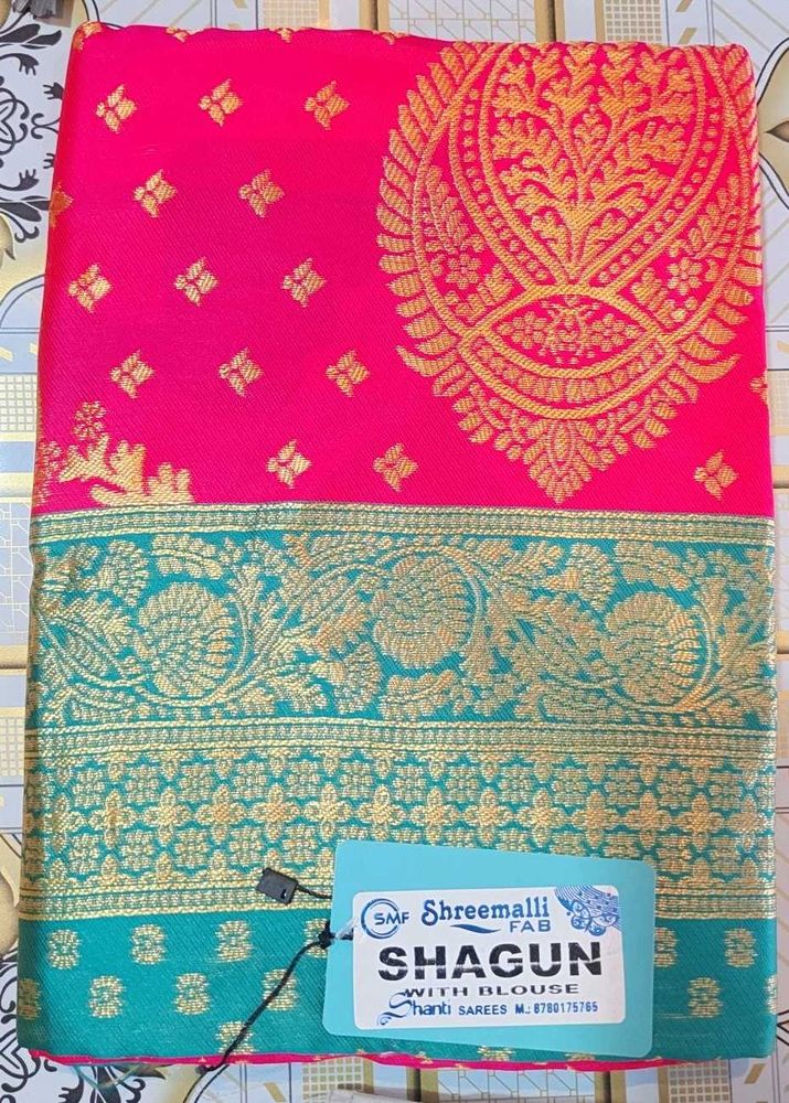 Beautiful Pink Silk Saree with Teal Border