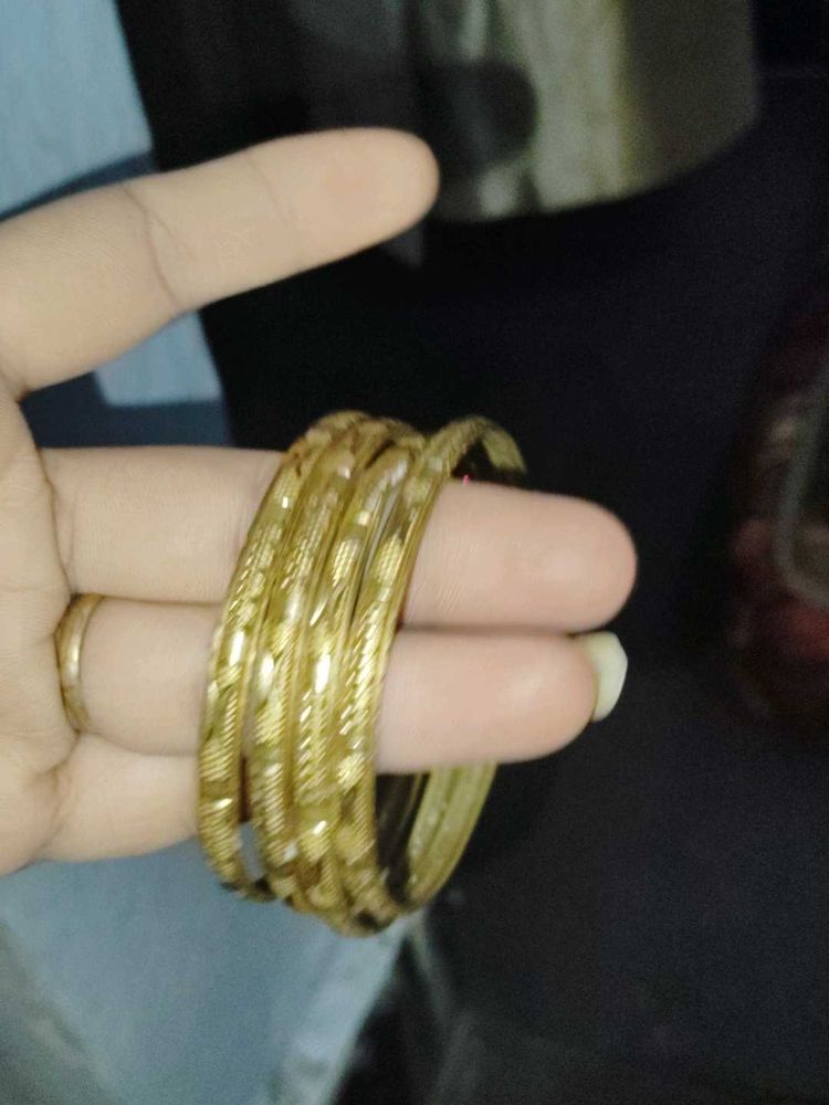 Set of Golden Bangles and 1 singe bange watc