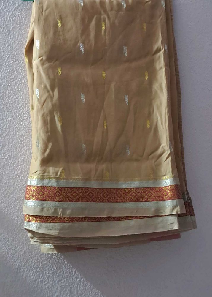 Elegant sandle Saree with Golden &amp; Silver Motifs