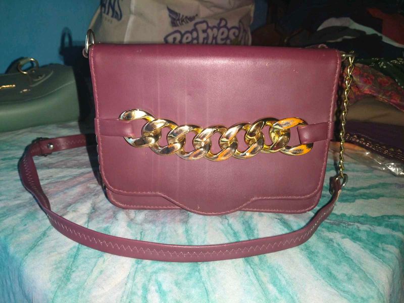 Chic Maroon Crossbody Bag with Gold Chain