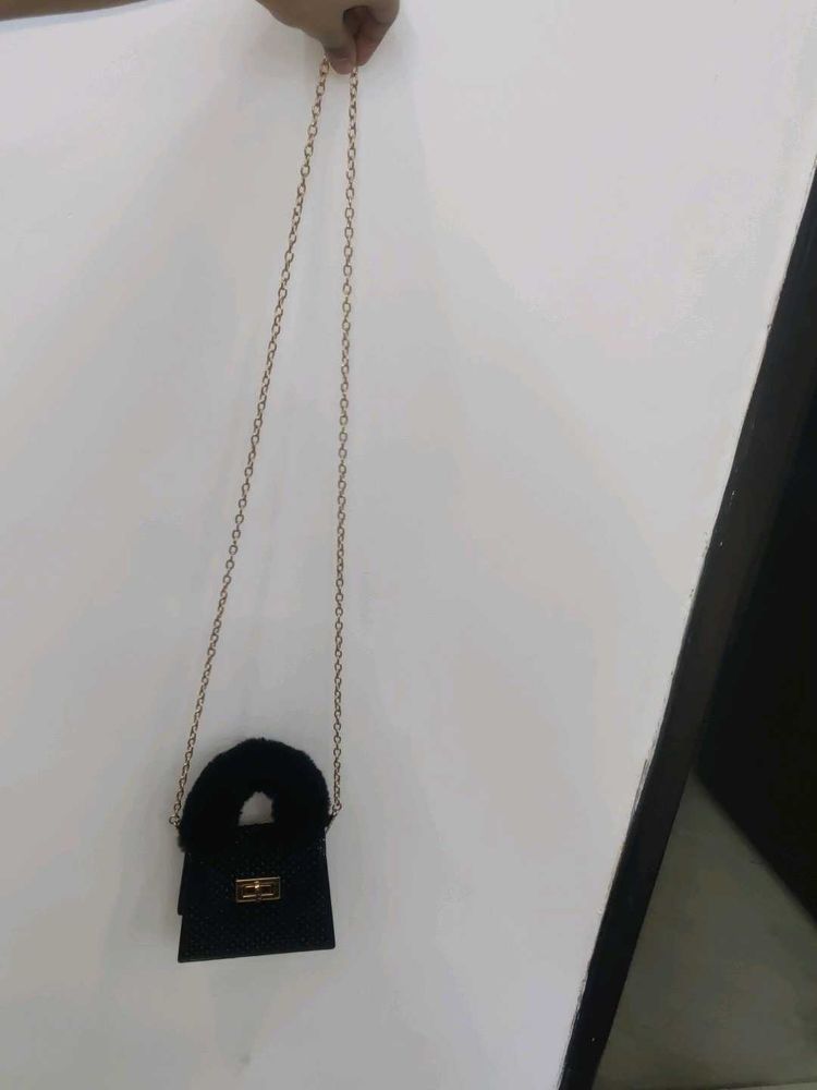 Chic Mini Black Handbag with Fur Accent