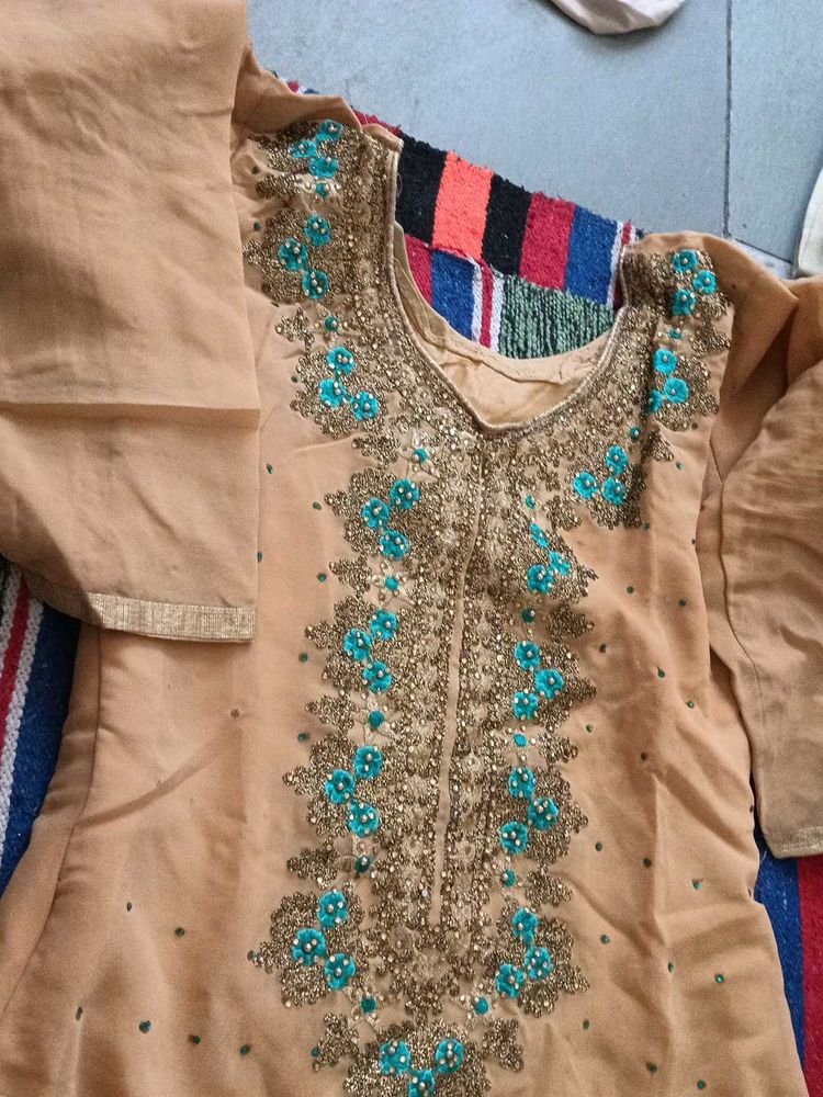 long kurti and garara golden colour