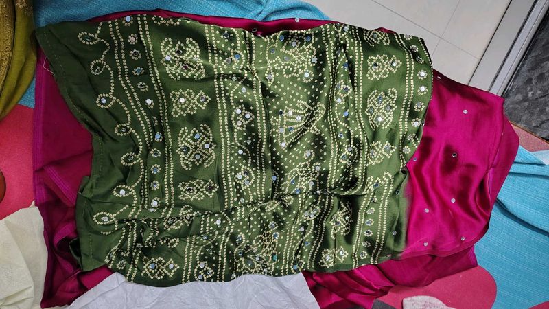 megenta Bandhani Saree with mehndi Border