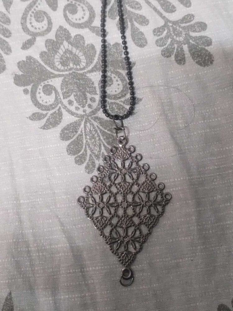 Intricate Silver Tone Pendant Necklace