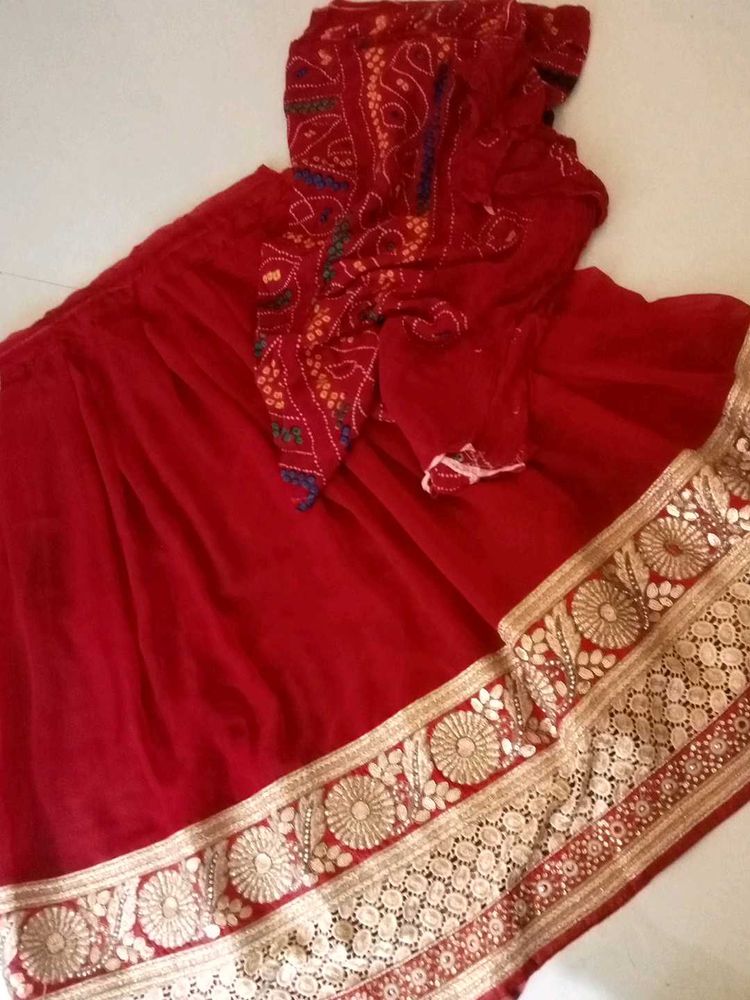 Red Embroidered ghagra with bandage odhna