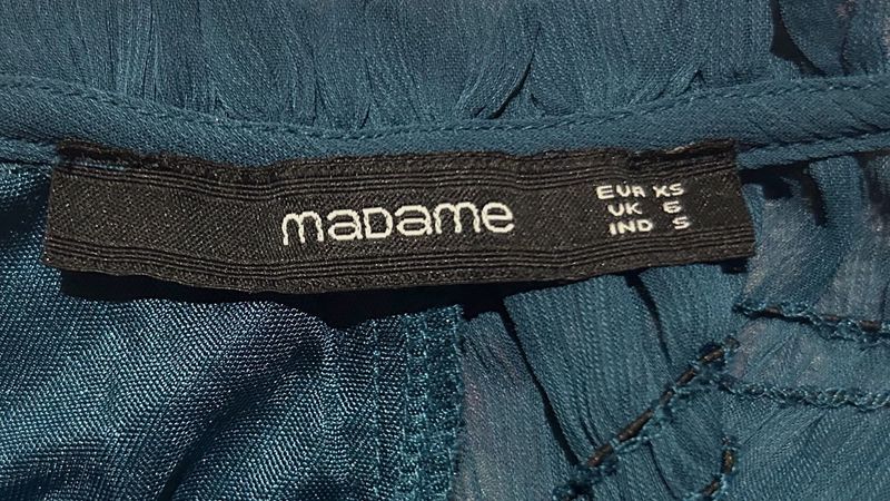Madame Top