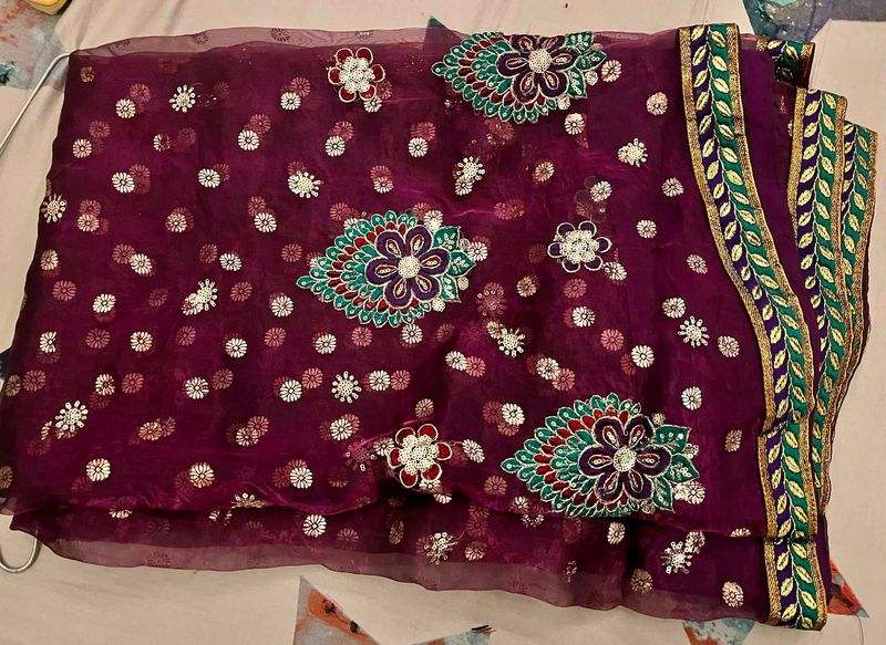 Embroidered Purple Net Saree