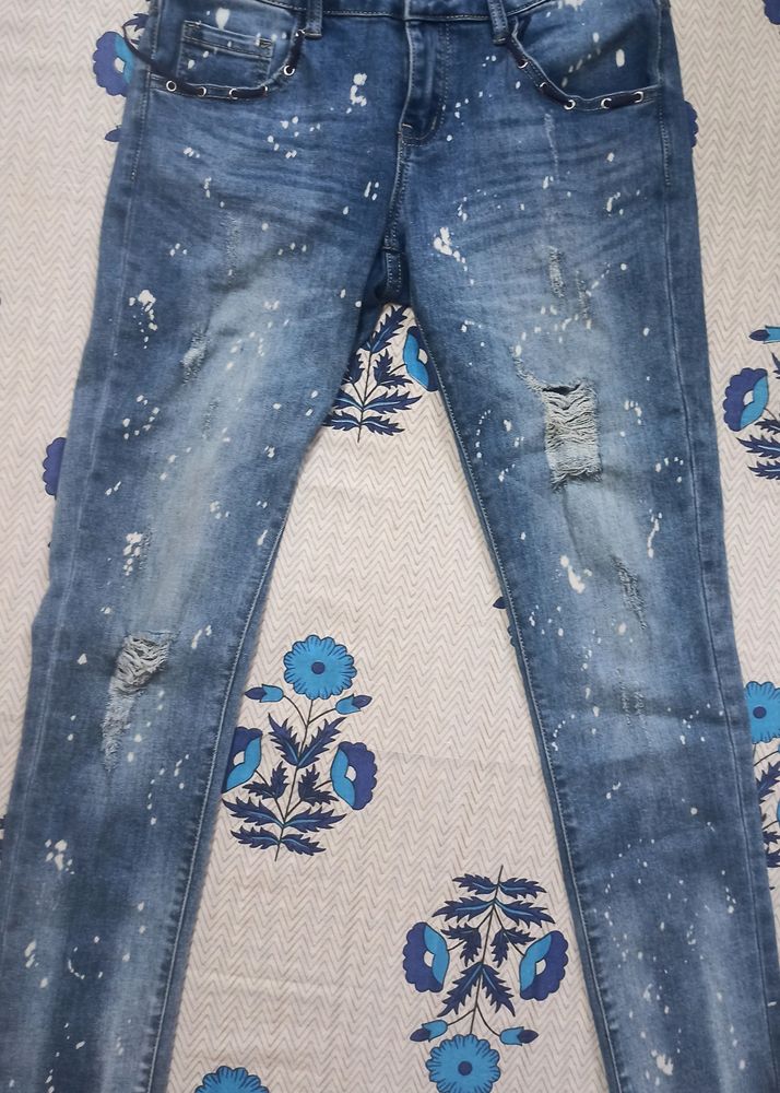Distressed Denim Jeans