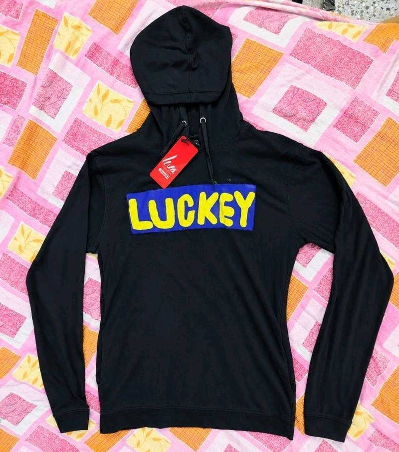 Black hoodie with "LUCKEY" graphic