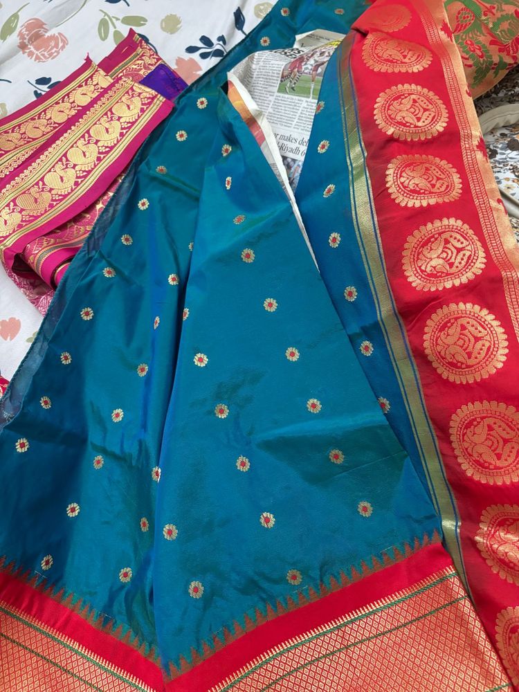 Beautiful Teal Saree with Red Border